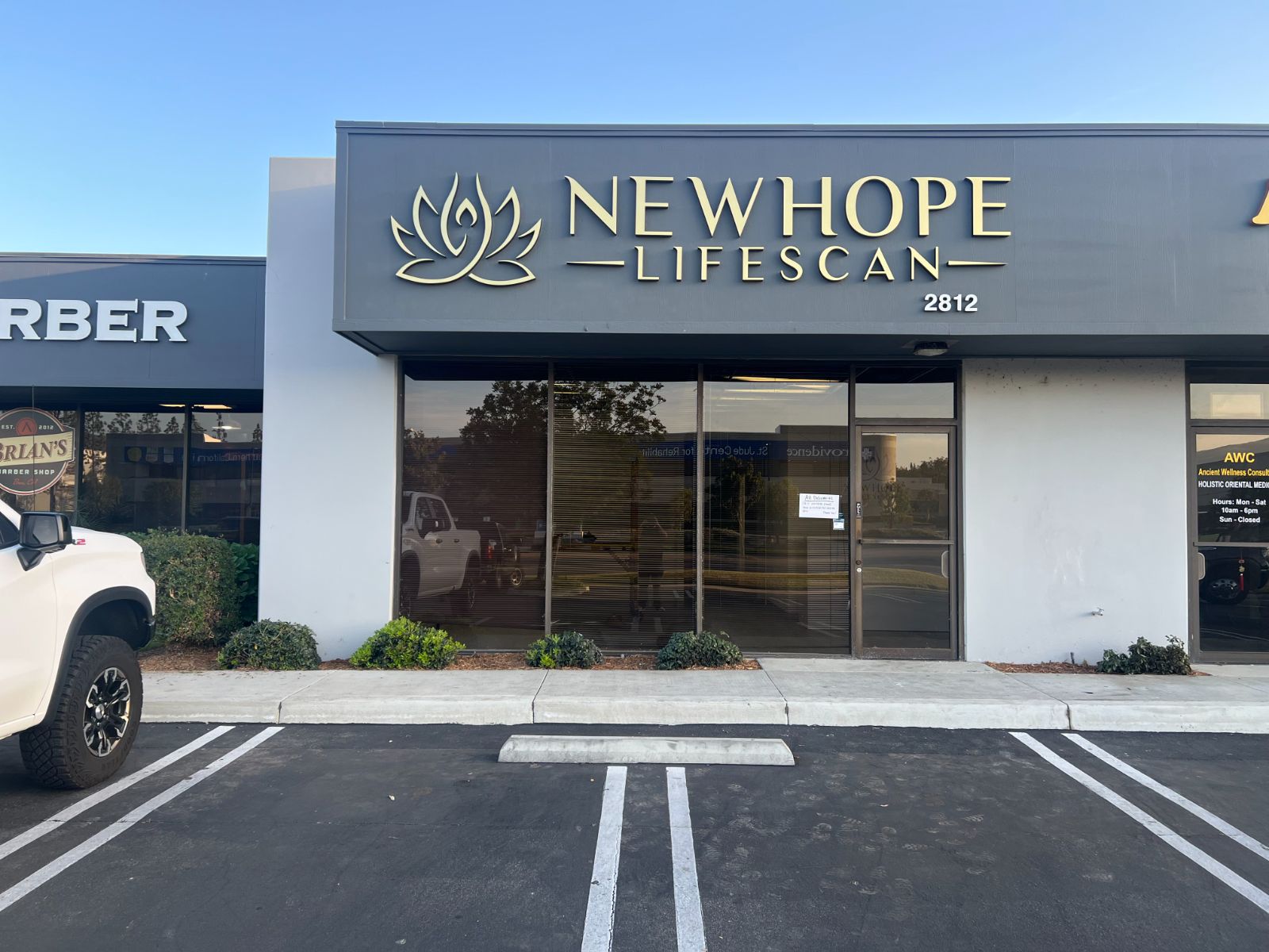 Exterior storefront fascia for NewHope Lifescan: gold-faced dimensional letters